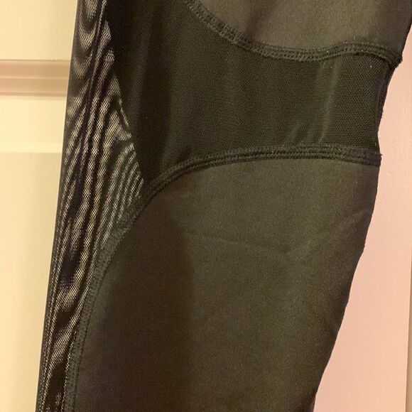 Lotus leggings size small black.  Detail sheer sections of the legs - Picture 4 of 7